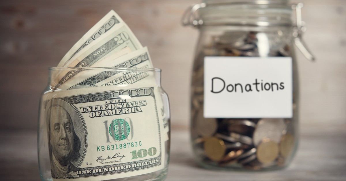Fundraising and Finance: Understanding the School-Volunteer Relationship Donation jars filled with cash and coins