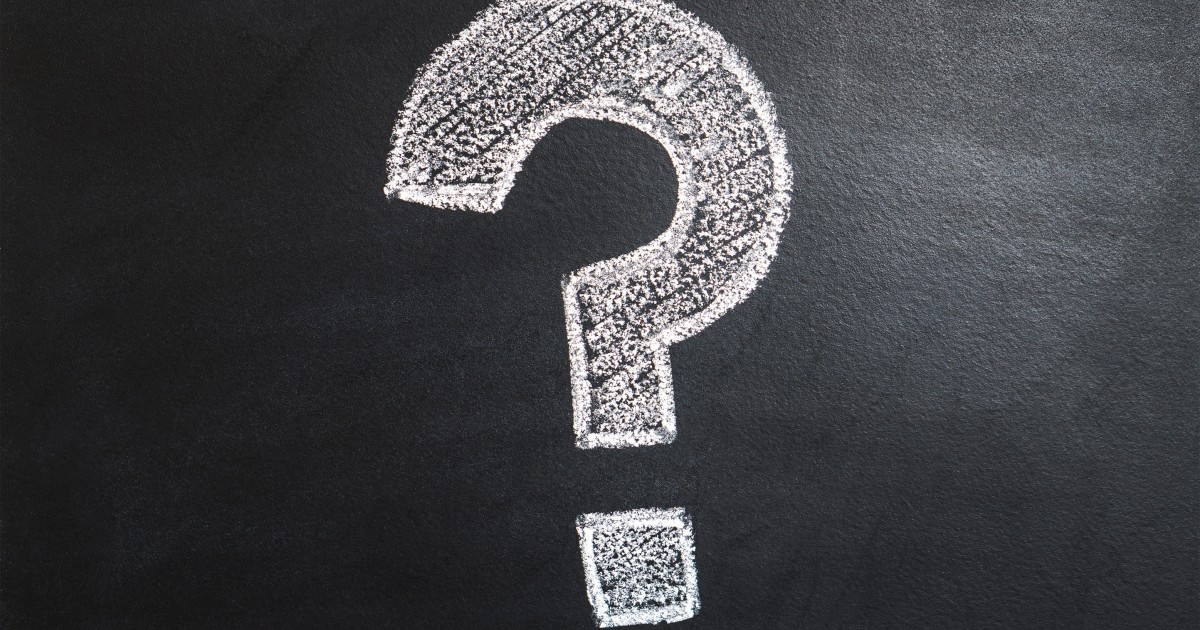 Why isn’t free public education free? Large question mark on a chalkboard