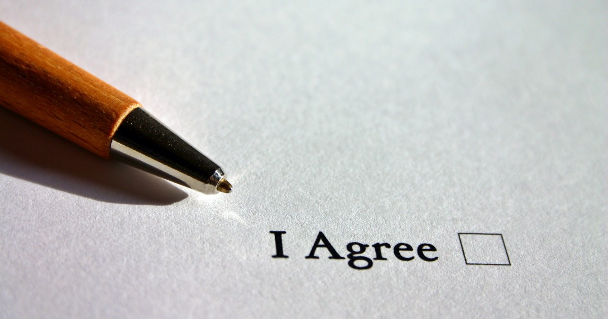 PBUSA IFA Policy Pen laying next to checkbox with the words, I agree