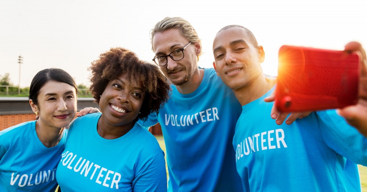 Updating your GuideStar Profile Four volunteers taking a selfie